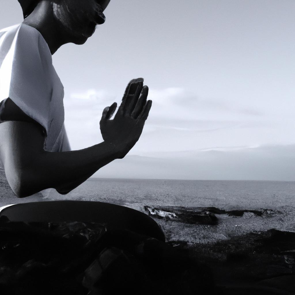 Person meditating in prayer pose